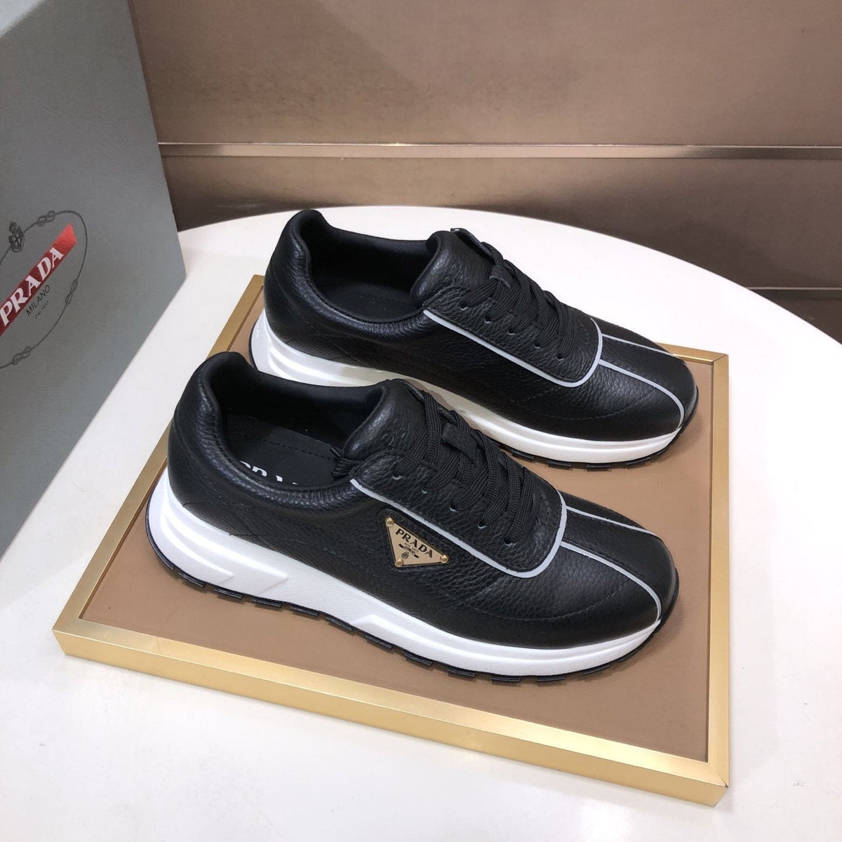 Prada Triangle Plaque Low-Top Sneakers - Triangular Side Plaque Detail