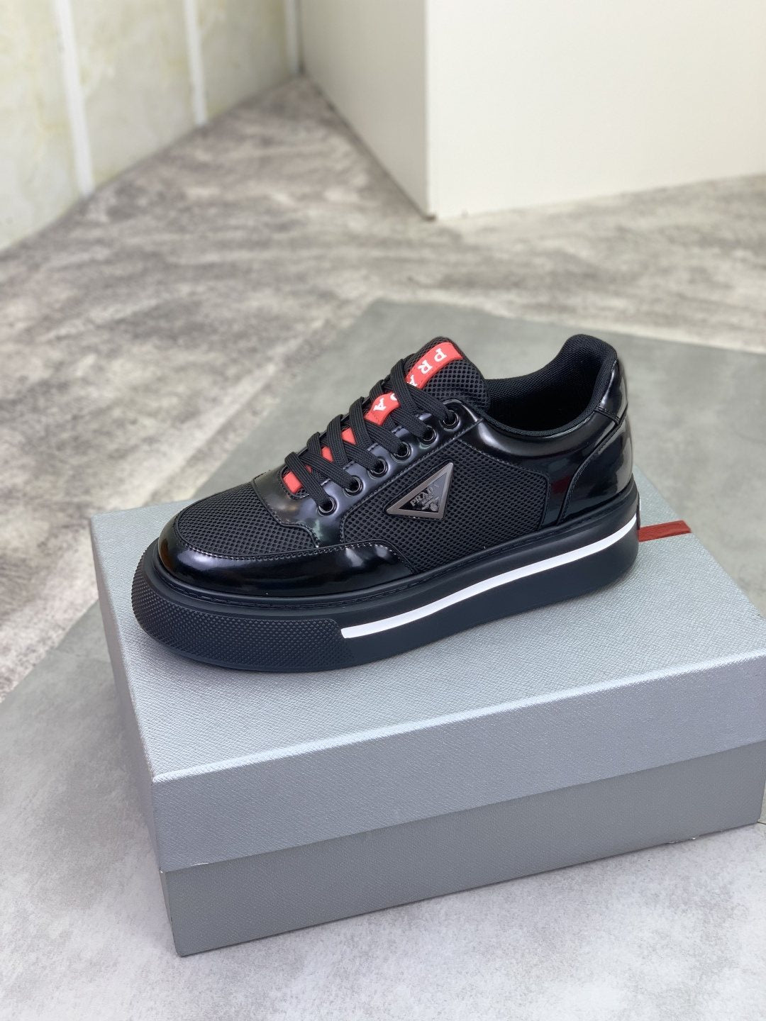 Prada Triangle Patch Low-Top Sneakers